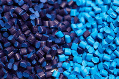 Full frame shot blue polymer granules