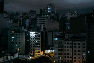 High angle view of illuminated cityscape at night