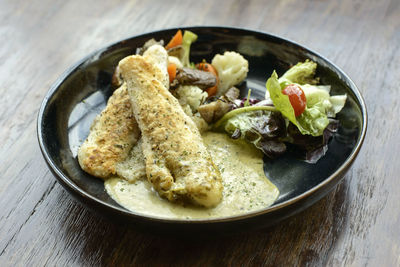 Close-up of food in plate on table