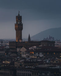 Buildings in city at night