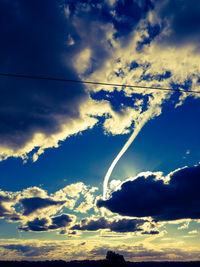 Low angle view of vapor trail in sky