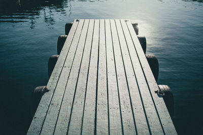 Pier over lake on sunny day