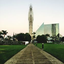 View of park against clear sky in city