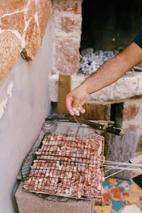 Cropped image of people having food