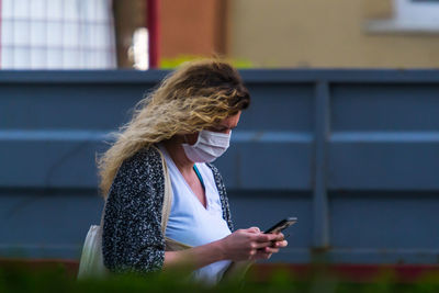 Woman using mobile phone