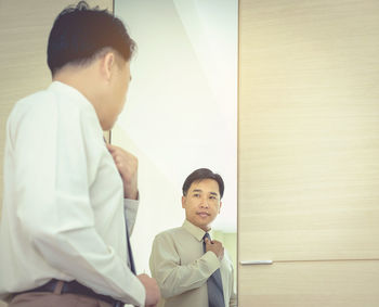 Boy working in a room