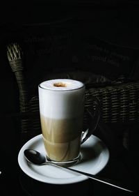 Close-up of coffee cup on table