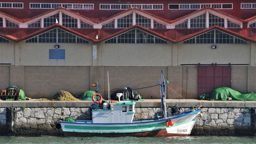 Boats moored in sea