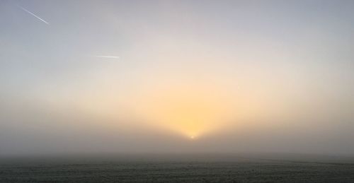 Scenic view of landscape at sunset