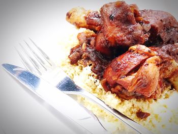 High angle view of meat in plate on table