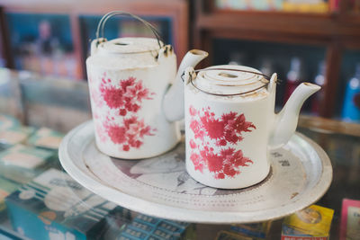 Close-up of chinese teapots on table