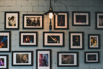 Illuminated lanterns hanging on wall in store