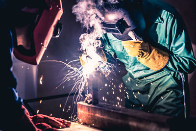 Man working on metal structure