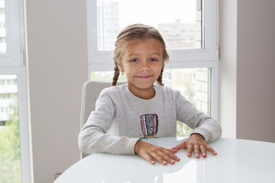 Portrait of smiling girl at home