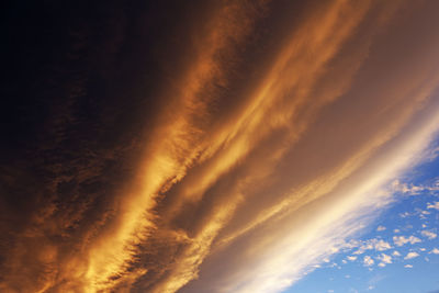 Low angle view of clouds in sky during sunset