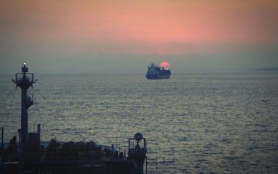 Scenic view of sea at sunset