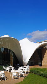 View of buildings against blue sky