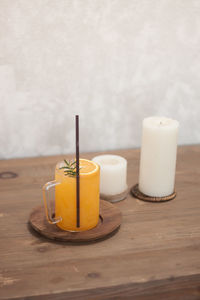 Close-up of drink in glass jar on table