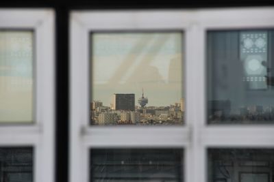 Reflection of cityscape on window