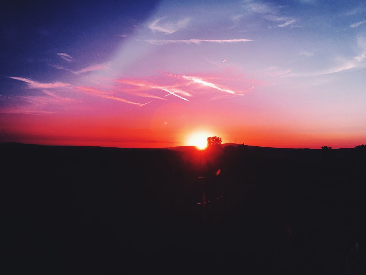 SILHOUETTE LANDSCAPE AGAINST SKY DURING SUNSET