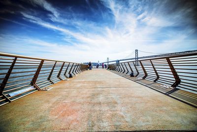 View of bridge against cloudy sky