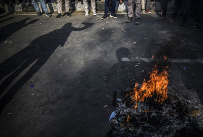 High angle view of people on fire in city