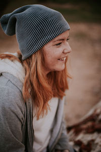Portrait of woman wearing hat