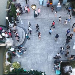 High angle view of people on street in city