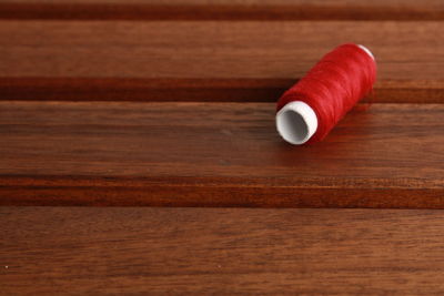 Close-up of ring on wooden table