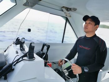 Side view of me in the boat navigating to the dive site