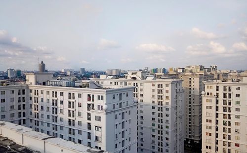 Buildings in city against sky