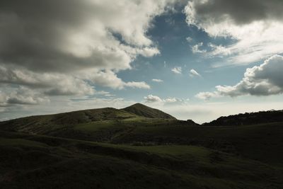 View of landscape against cloudy sky