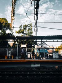 Train on railroad station platform against sky