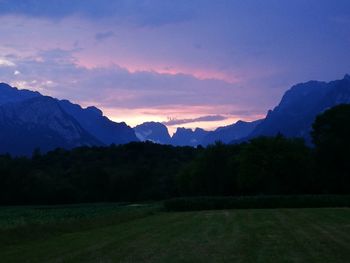 Scenic view of mountains against sky during sunset