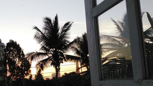 Built structure against sky at sunset