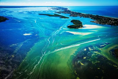 Scenic view of sea against blue sky