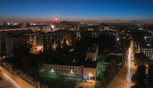 High angle view of illuminated buildings at night
