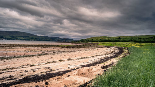 Scenic view of land against sky