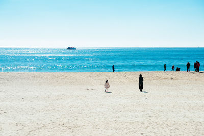 Scenic view of sea against blue sky