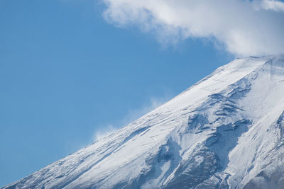 Snowcapped mountain against sky