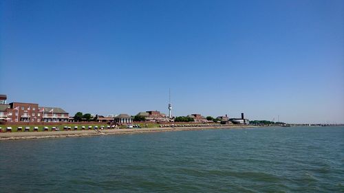View of buildings against blue sky