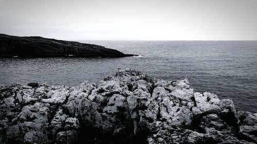 Scenic view of sea against clear sky