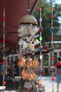 Close-up of illuminated lanterns hanging in market