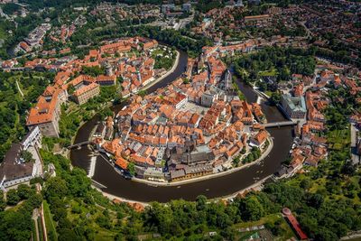 High angle view of river amidst buildings in city