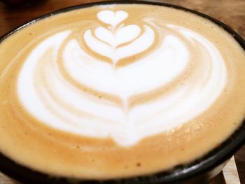 Close-up of froth art on coffee