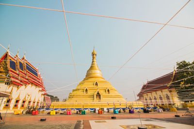 Panoramic view of buildings against clear sky