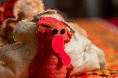 A handmade turkey plush used for fall and autumn decoration.