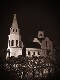 Low angle view of historic building against sky at night