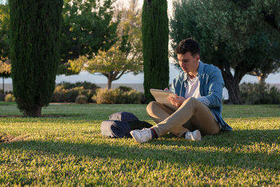 Man sitting on book