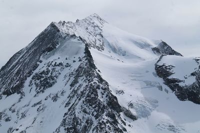 Snowcapped mountains against sky